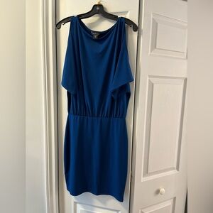Blue dress, top is dolman style sleeve with cut out on shoulder.